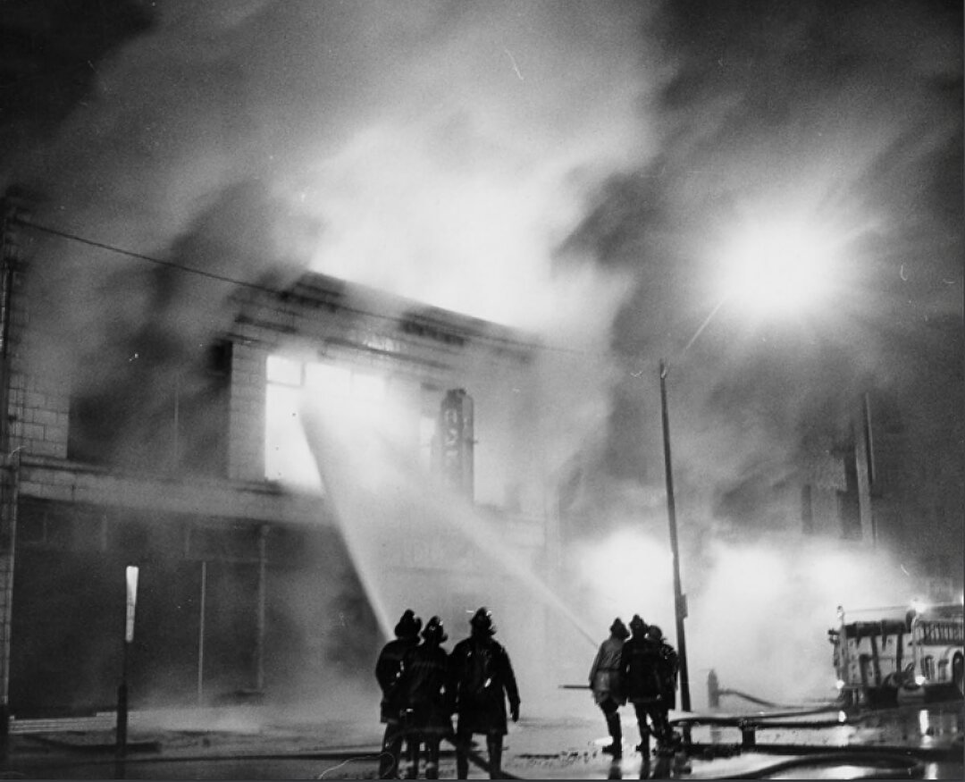 Firemen Putting Out Flames