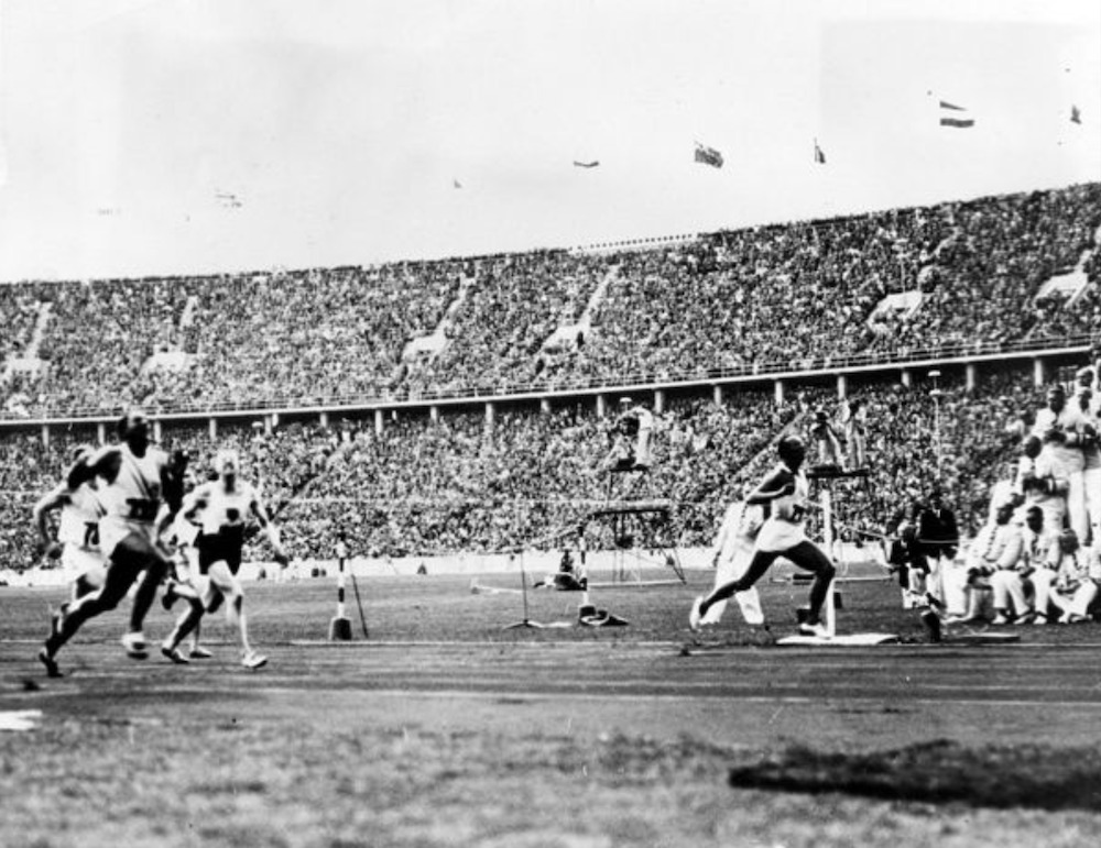 Winning the 100 yard dash at the Berlin Olympics