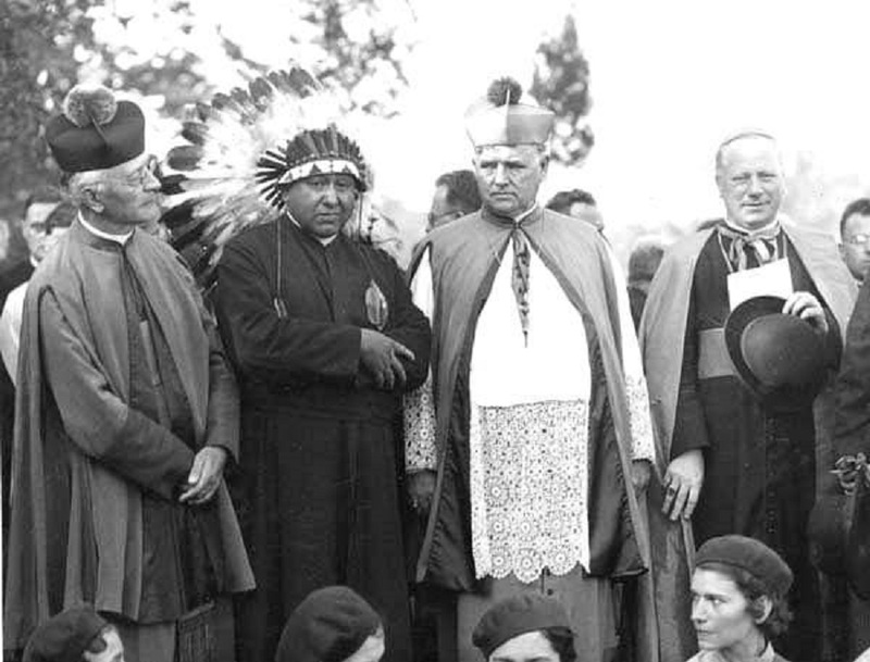Father Vitus Hribar (on the left) at a ceremony at the Cleveland Cultural Gardens