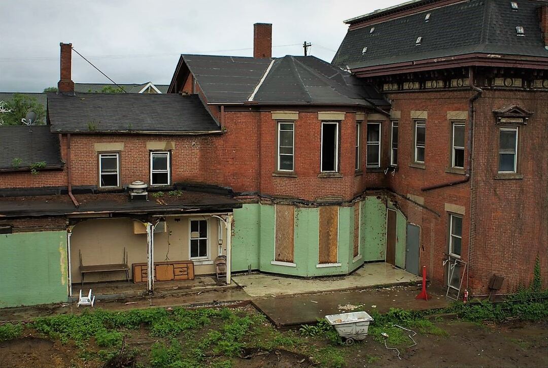 Side porch revealed on Cook-Bousfield Mansion