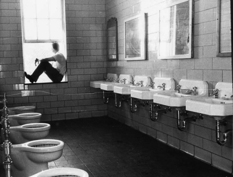 Ward C Patient Gazes Out Restroom Window