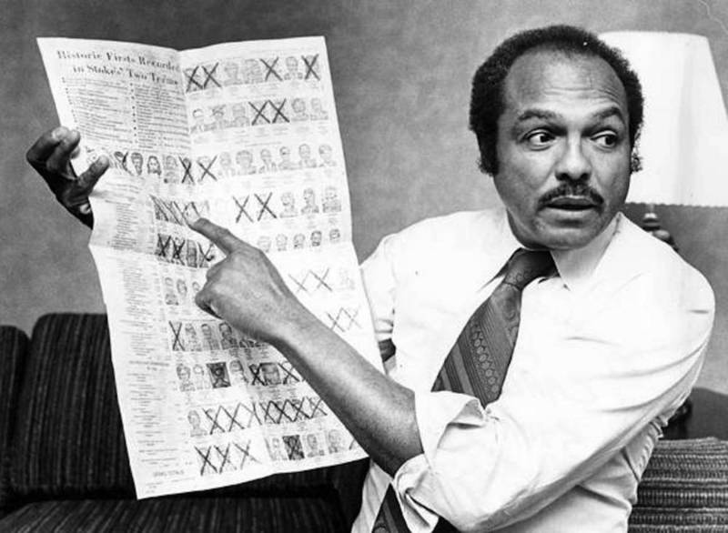 Carl Stokes with Paper